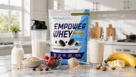 NWP protein drinks Canada setup with whey protein pouch, creamy drink, shaker bottle, oats, berries, banana, and almonds in a clean kitchen.