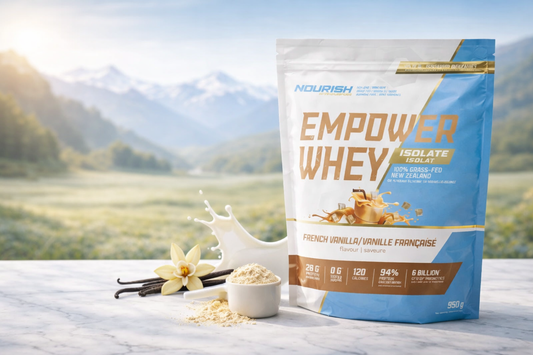 New Zealand whey protein isolate by NWP Supplements with vanilla pods, protein scoop, and milk splash on marble surface representing premium quality and purity